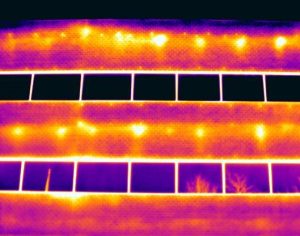 Bldg heat loss Infrared Imaging Services LLC 1 1 300x236 - Thermal image shows hot spots on wall where the building frame conducts heat to the outside - Infrared Imaging Services LLC